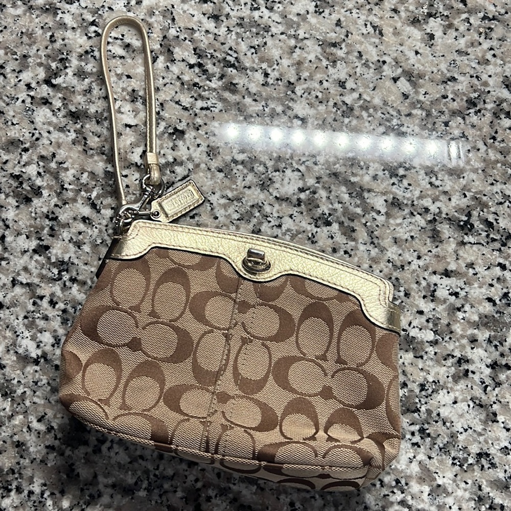 Coach wristlet tan with gold accents